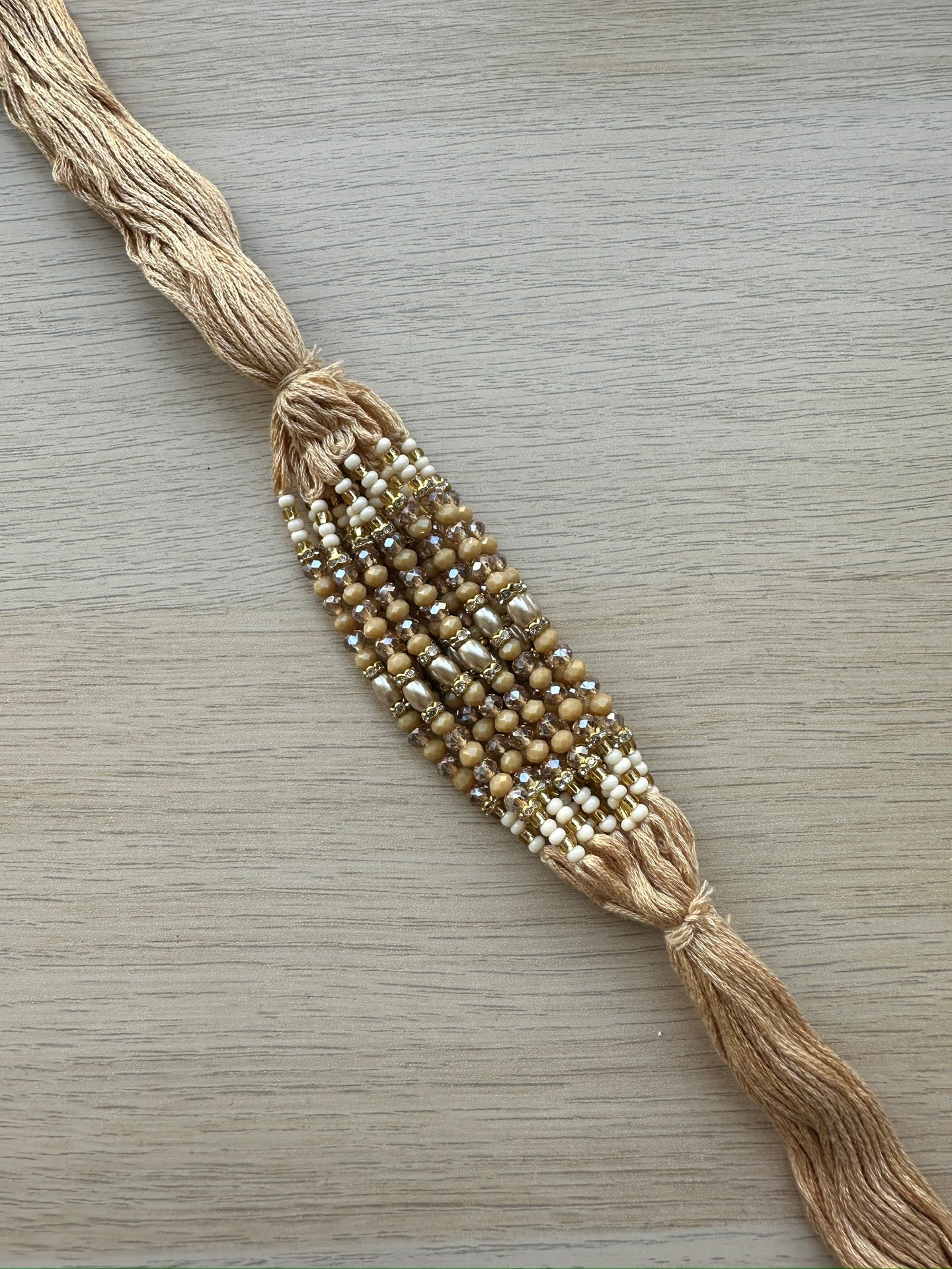 raksha bandan, rakhi, rakhri, nude string, champagne stones, nude stones, iridescent stones, white stones